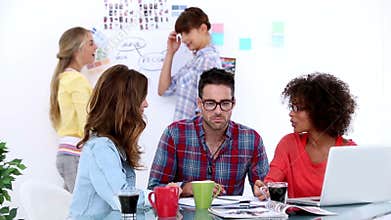 Team of designers brainstorming in their office