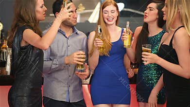 Well dressed friends having party together