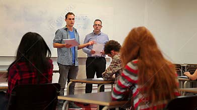 Student giving a presentation to his class