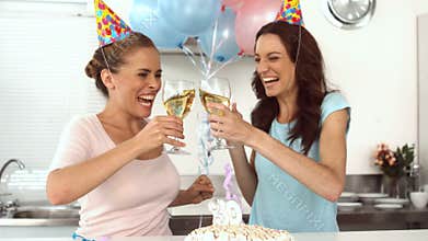 Woman blowing candle and celebrating her birthday