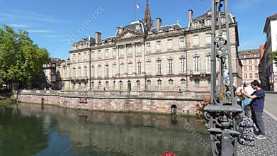 Summer view near the Ill River in Strasbourg with Cathedral and Palais Rohan in the background
