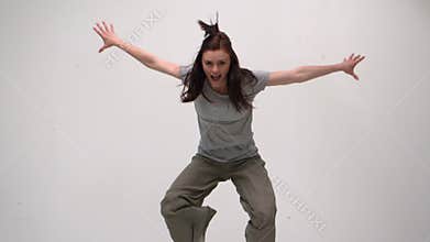 Charming young woman jumping