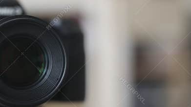 Photographer operating a camera