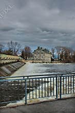 Landscape of the old mill seen from the footpath in a park in Terbonne