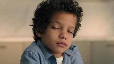 Portrait upset disappointed African little boy son frustrated thoughtful child kid American offended baby think looking