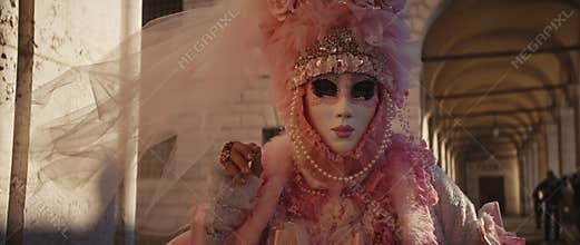Portrait of lady in vintage dress with lace flowers and veil at Doge Palace