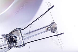 Abstract Light Bulb Detail with Wires on White Background