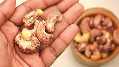 Learning how to peel cashew nuts at home