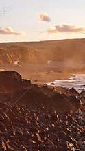 Afterglow over the sandy volcanic beach of Santa Barbara, Ribeira Grande, Sao Miguel Island, Azores, Portugal