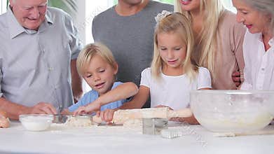 Happy children having fun baking