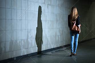 Woman walking alone at night