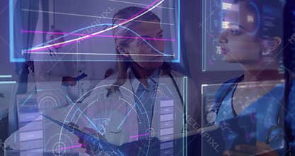 Medical data overlays fading senior doctor tapping tablet chart, younger doctor reviewing metrics
