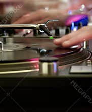 DJ at the turntables