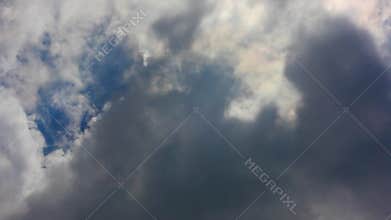 Moving clouds and blue sky