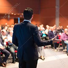 Speaker at Business Conference and Presentation.