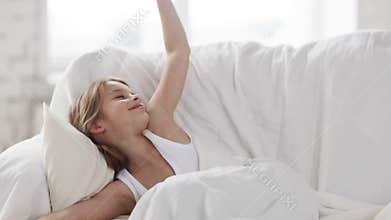 Pre-teen girl sleeping at home