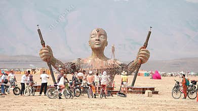 Humanoid wood and wire sculpture at Burning Man, Black Rock Desert