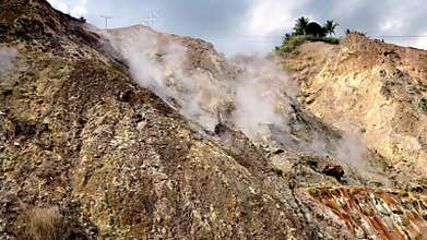 geothermal hot springs steam emissions with hydrogen sulfide in the mountains of the Philippines Asia