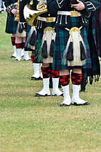 Line of musicians in Kilts