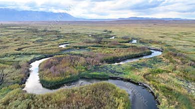 Aerial Owens River California Wetlands and Mountains Flyover