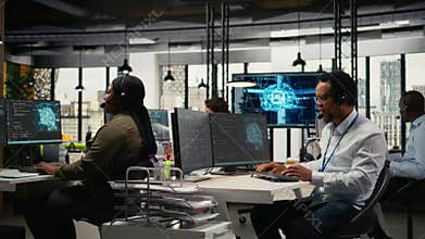 Startup programmers doing tech support, helping users fix errors