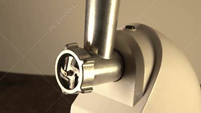 Electric meat grinder is working. Knife chop is spinning video with sound. Stainless grind close up