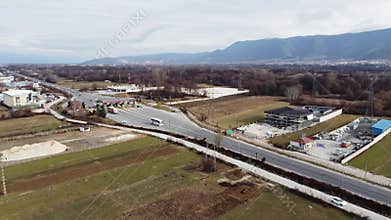 Aerial View of Cars Passing Through a Toll Booth