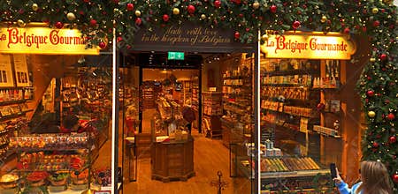 BRUSSELS, BELGIUM - NOVEMBER 26, 2025 - La Belgique Gourmande chocolate shop decorated for Christmas