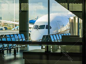 Airliner in airport window