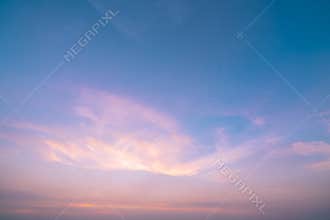 Dramatic pink and blue sky and clouds abstract background. Art picture of orange clouds texture. Beautiful sunset sky. Sunset sky