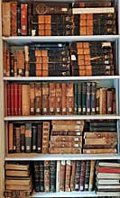 Old ancient books on library shelves