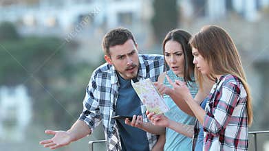 Three lost tourists arguing checking map