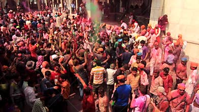 Barsana, India - 20180223 - Holi Festival - People Throw Paint Into Crowd.