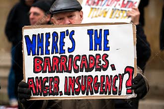 Small group of angry anti government anarchists stage a protest at Portland Place, London.