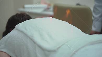 Close-up Chinese fire massage. Traditional chinese medicine, fire treatment and bodycare concept