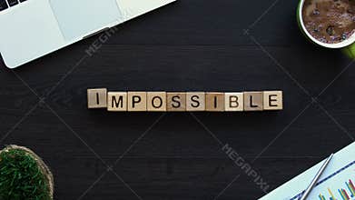 Impossible to possible, hand putting word of cubes, motivation for development