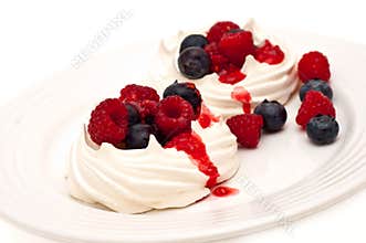 Berries on meringue nests