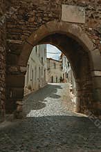 Arched door in stone wall at the Castle of Estremoz