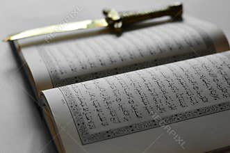 The Koran and a knife, love and war