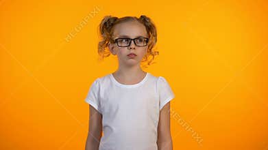 Cute teen girl thinking, planning future career, little genius developing idea