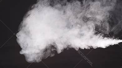Smoke in slow motion. Smoke on black. White smoke.
