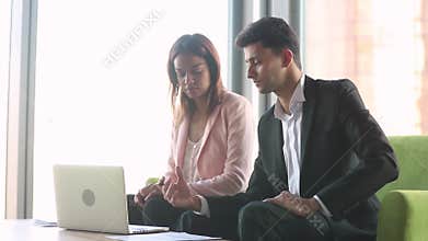 Arab businessman broker presenting african consulting client looking at laptop