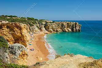 View of limestone cliffs and the Rabbit Beach Praia da Coelha in Albufeira, District Faro, Algarve, Southern Portugal