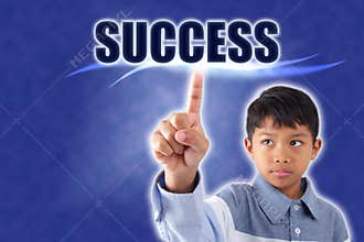 Asian boy touching success word