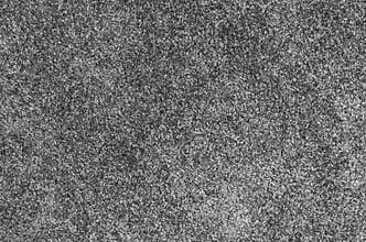 Seamless monochrome grey carpet texture background from above