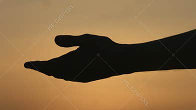 Man lending hand to woman at romantic date, offering support, togetherness