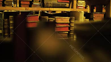 Bookshelves in old library with lots of books