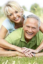 Mature couple having fun in countryside