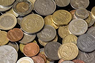 Coins from different countries. Nice money background.