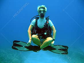 Diver weightless underwater